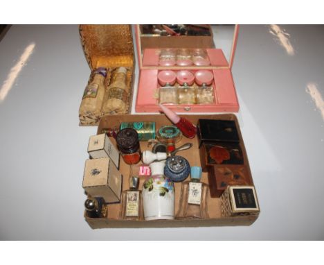 A box containing various scent bottles, trinket boxes, a make-up tin etc.