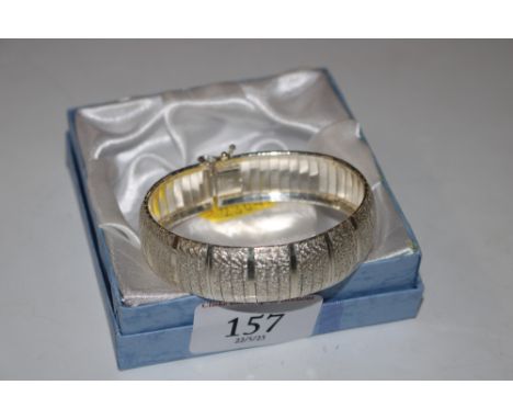 A Sterling silver articulated bangle, approx. 28gms 