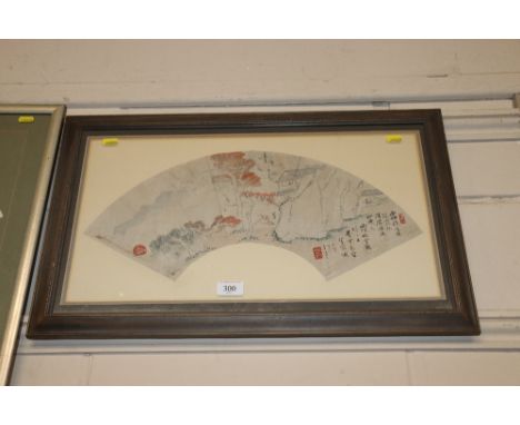 A Japanese fan shaped print framed and glazed 