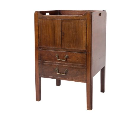 A Georgian mahogany tray top converted commode:, with pierced carrying handles to the sides, enclosed by a pair of doors and 