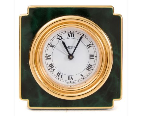 le Must de Cartier, Paris Alarm Clock: a gilt-brass and green enamel alarm clock, the round white dial having black Roman hou