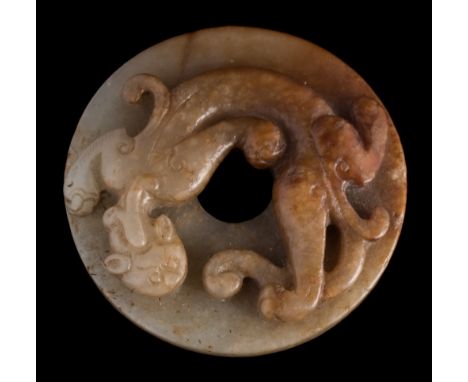 A Chinese 'chilong' jade disc, bi: in the Ming manner, carved with a single chilong, the reverse with incised scroll motifs, 