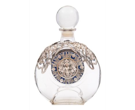 A Guerlain, Paris, an Art Nouveau clear glass, white metal and blue enamel mounted scent bottle: of moon flask outline, with 