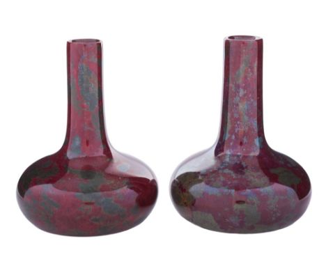 A pair of Ruskin high fired miniature bottle vases: by William Howson Taylor, each decorated in a flambé soufflé glaze, signe
