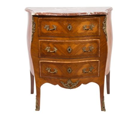 A French mahogany crossbanded and inlaid serpentine fronted bombe commode:, in the Louis XV taste, bordered with boxwood and 