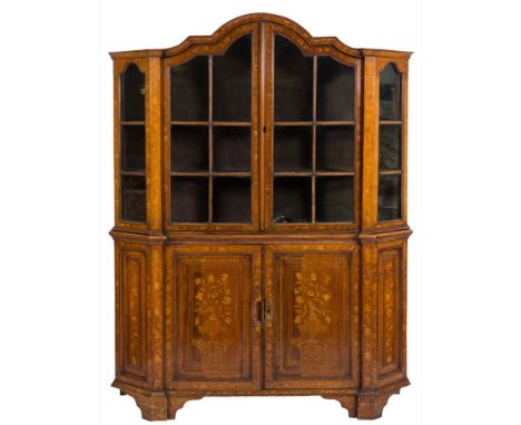 An early 19th century Dutch mahogany, oak and floral marquetry domed display cabinet: of canted design, the upper part with a