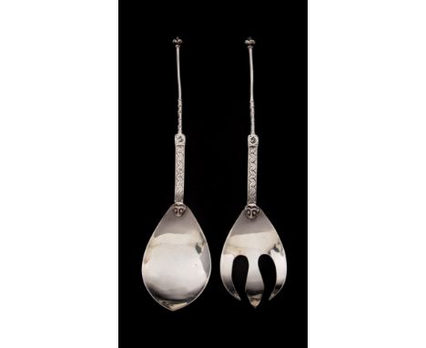 A pair of Iona silver salad servers, maker I.M.S, Iona, Scotland: with ovoid shaped bowls, Celtic knot decorated stems and fl
