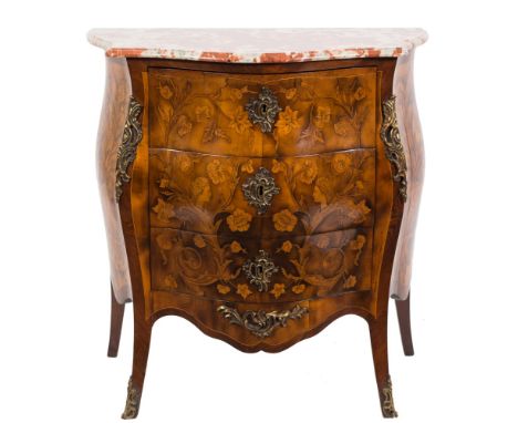 A French walnut, kingwood floral marquetry and gilt metal mounted serpentine fronted bombe commode:, with a grey and rouge va