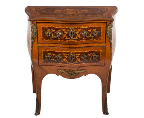 A late 19th Century French rosewood, kingwood, marquetry and gilt metal mounted serpentine fronted bombe commode in the Louis