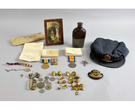 A collection of personal effects belonging to Squadron Officer Aileen 'Mike' Bowen Morris MBE, including her R.A.F. peak cap 