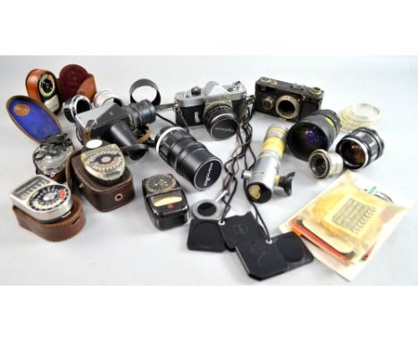 Minolta SR-1 with a selection of lenses, Contax camera body, Pentax Spot exposure meter, various other light meters to includ