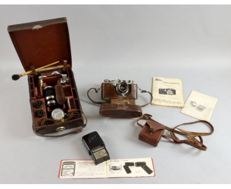 Leica D.R.P. No 229395, camera body with Leitz Elmar f=5cm 1:35 lens, f=9cm 1:4 lens No 135972, Summar f=5cm 1:2 lens No 3517