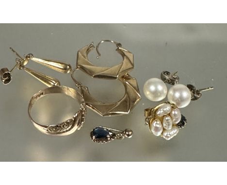 A collection of pierced earrings including pearl studs, yellow metal fluted tear drop earrings, sapphire tear drop earrings, 