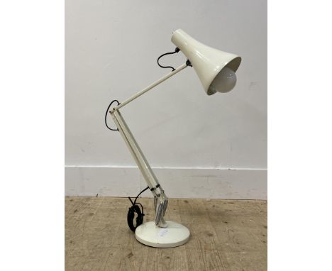 A Vintage angle poise type lamp with a conical shade and finished in white H85cm
