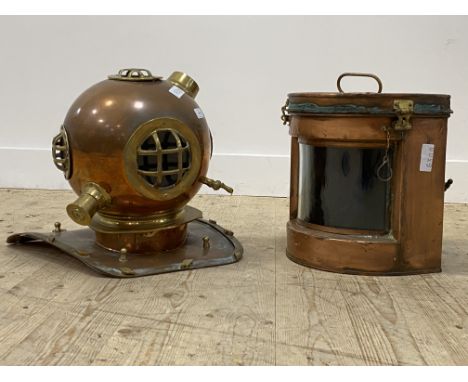 A 20th century brass mounted copper model of a divers helmet (H38cm) together with a 19th century brass mounted copper ships 