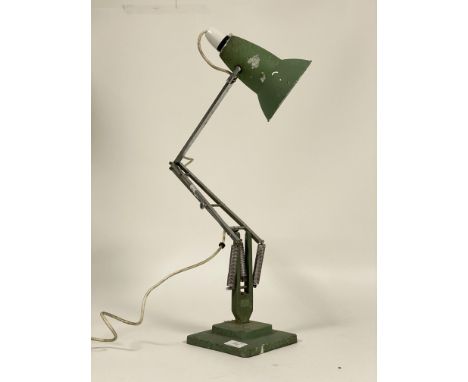 Herbert Terry and Sons Ltd. A mid century vintage Anglepoise lamp, finished in green and (tarnished) chrome plate, on a stepp