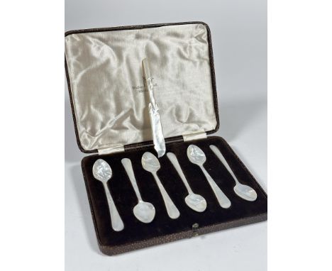 A Set of six mother of pearl Caviar spoons in fitted case retailed by Walker &amp; Hall and a fork, (L x 11cm) small chip to 