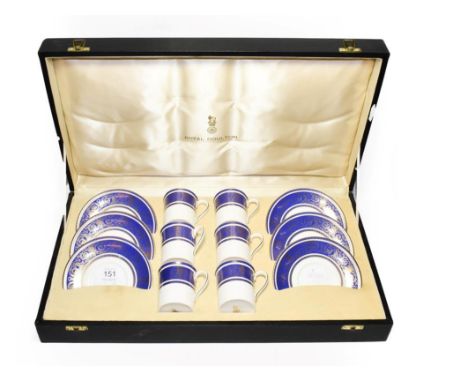 A cased Royal Doulton six-piece coffee cups and saucers set, pattern number: H4983.  Good clean condition. No damage or repai