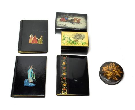 Three lacquer note books, a Russian snuff box, a lacquer box and a fernware box
