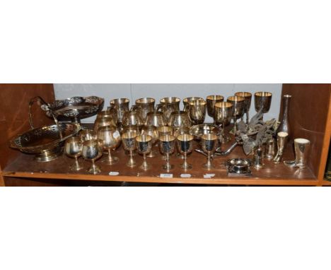 A quantity of silver plated ware including an oval shaped pedestal bowl, oval shaped single handled basket, a pair of ornamen