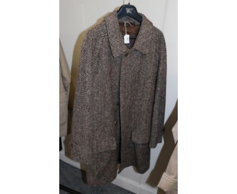 Circa 1990/2000s Burberry men's classic single breasted wool overcoat, in mid brown herringbone, button fastening, flap pocke