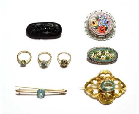 A gem set ring, stamped '18CT', finger size H1/2; two 9 carat gold gem set cluster rings; a gem set bar brooch, stamped '9CT'