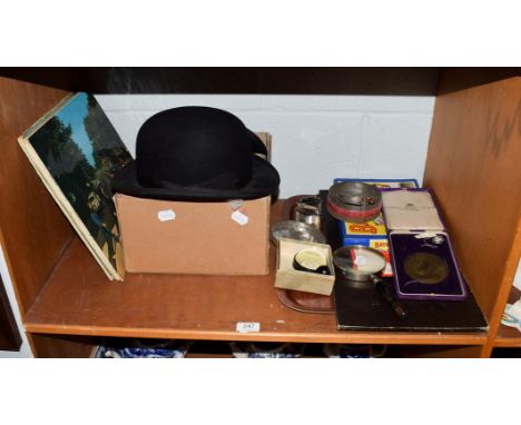 A selection of collectors items including: three Ronson lighters, three military cap badges: a cased commemorative medal ''Th