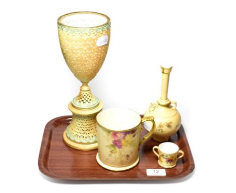 A Royal Worcester blush ivory pierced vase and three other Royal Worcester floral decorated items, consisting of a miniature 