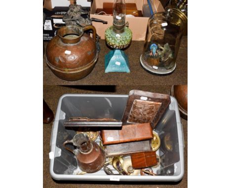 A selection of copper and brass ware including a copper jug, horse brasses, copper adam and eve plaque, spelter sculpture dep