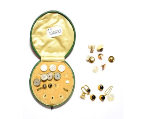 A selection of studs, including a cased set of four gilt metal studs, a pair of mother-of-pearl cufflinks, two cultured pearl