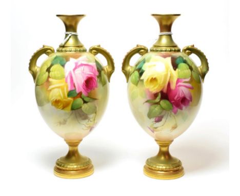 A pair of Royal Worcester twin-handled rose decorated vases, shape number 2304. One monogramed A.S., 22.5cm. Good condition, 