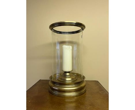 A large cylindricalÿbrass and glass Candle Lantern, approx. 50cms (19 1/2") h; together with a baluster glass candle lantern 