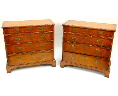 A good pair of George II style walnut Bachelors Chests,ÿeach with herringbone banding and a rectangular moulded top above fou