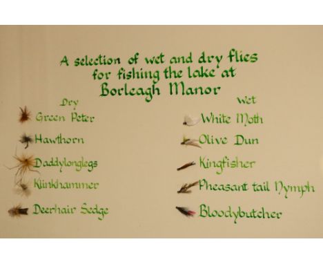A selection of wet and dry Flies, for fishing the lake at Borleagh Manor with manuscript text, mounted in maple frame. (1) 