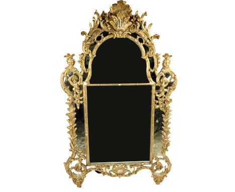 An attractiveÿand large early 18th Century French giltwood Mirror Overmantel, probably R. Gence, c. 1715, the shaped floral d