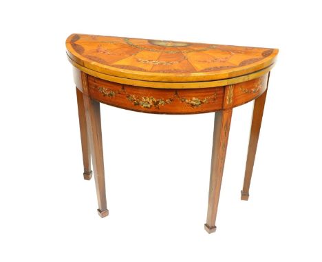 A very fine Edwardian decorated and inlaid satinwood demi-lune fold-over Card Table, the top decorated with a classical woman