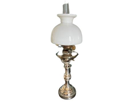 A heavy silver plated Oil Lamp, with triple knop stem, circular moulded base and cream glass shade, 68cms (27"). (1)