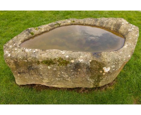 An early highly important naturally formed granite Horse Trough, with carved out centre, asymmetrical formed, approx. 92cms h