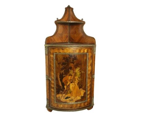 An exceptional pair of late 19th Century French kingwood and marquetry Hanging Corner Cupboards, with ornate brass mounts and