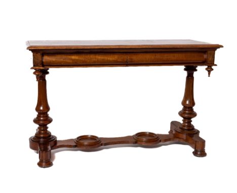 A rectangular Victorian mahogany Side Table, the moulded top above two frieze drawers raised on baluster turned supports and 