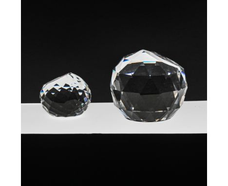 Swarovski Crystal Glass, One Members Paperweight and One E.R. Paperweight, boxed.
