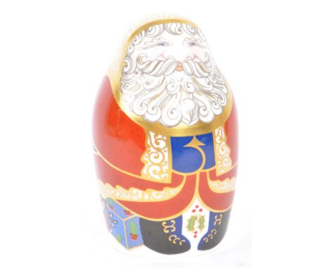 Royal Crown Derby - A 20th century Crown Derby imari bone china paperweight in the form of Santa Claus. With original gold st