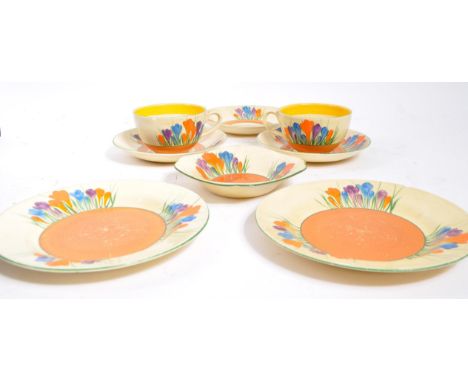 Clarice Cliff - Crocus - A collection of 20th century circa 1930s bone china pieces toc include two teacups, three saucers, t