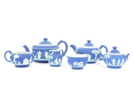 Wedgwood - A collection of 20th century Wedgwood Portland jasperware tea service pieces to include two teapots, two sugar bow