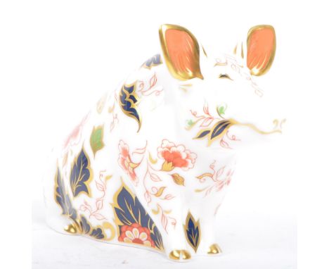 Royal Crown Derby - A 20th century Crown Derby imari bone china paperweight in the form of a Pig. With original gold stopper.