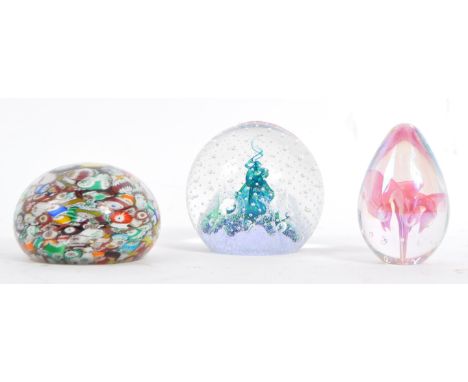 A 20th century Milliefiori cane worked glass paperweight together with a Caithness Fascination pattern paperweight and a smal