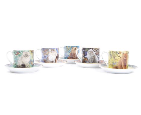 A collection of five Lesley's Cats cups and saucers created exclusively for Danbury Mint in fine porcelain by Lesley Anne Ivo