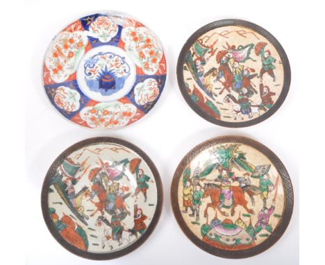 A collection of Japanese crackle glaze ceramic pottery display cabinet plates. With hand painted decoration to the body, of A