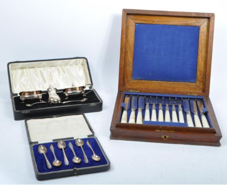 A collection of early 20th century circa 1920s knife and fork / condiment sets and a silver teaspoon set. All with cases and 