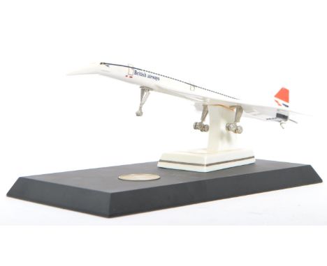 A Royal Worcester model entitled ' The First Flight of Concorde 21st January 1976 '&nbsp; Mounted on black base and, set with